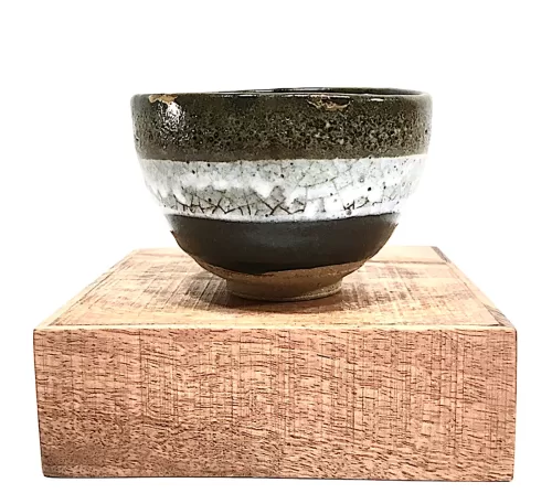 Helen_Kunzman_Tea-bowl-with-iron-and-white-glazes