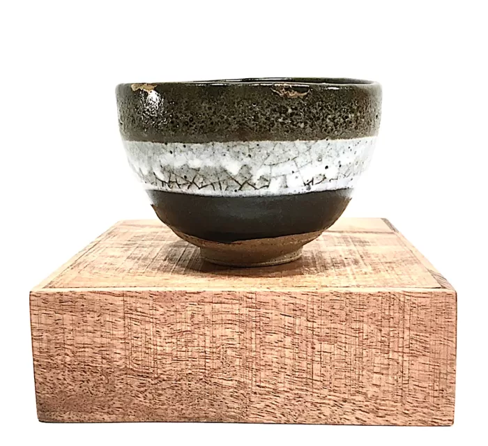 Helen_Kunzman_Tea-bowl-with-iron-and-white-glazes
